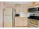 Kitchen features stainless steel appliances and wood cabinets at 7131 El Dewitt St, Zephyrhills, FL 33541