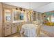 Charming dining area with built-in cabinetry and a round table at 7131 El Dewitt St, Zephyrhills, FL 33541