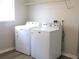 Bright laundry room with washer and dryer included at 1306 Idlewood Dr # 53, Sun City Center, FL 33573
