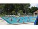Residents enjoying water aerobics in the pool at 3283 Hilary Cir # 2C, Palm Harbor, FL 34684