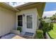 Neat front door entrance with landscaping at 3283 Hilary Cir # 2C, Palm Harbor, FL 34684