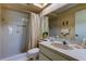 Clean bathroom with shower/tub combo and vanity at 3283 Hilary Cir # 2C, Palm Harbor, FL 34684