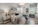 Bright bedroom with a comfortable bed and built-in workspace at 10386 Calumet Blvd, Port Charlotte, FL 33981