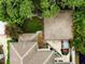 House and garage with brown roofs and a red car at 3104 W Fielder St, Tampa, FL 33611