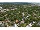 Aerial view of neighborhood, showcasing tree-lined streets at 3104 W Fielder St, Tampa, FL 33611