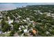 Aerial showing neighborhood's tree-lined streets and waterfront at 3104 W Fielder St, Tampa, FL 33611