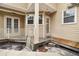 Back porch with wooden deck and access to the backyard at 3104 W Fielder St, Tampa, FL 33611