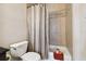 Clean bathroom with tub, shower, and updated fixtures at 3104 W Fielder St, Tampa, FL 33611