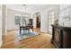 Elegant dining room with a granite table, chandelier, and access to the kitchen at 3104 W Fielder St, Tampa, FL 33611