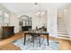 Bright dining room with hardwood floors and stairway access at 3104 W Fielder St, Tampa, FL 33611