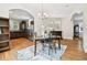 Spacious dining area with hardwood floors and kitchen views at 3104 W Fielder St, Tampa, FL 33611