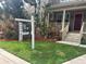 Well-maintained front yard with a 'For Sale' sign, showcasing lush greenery and appealing landscaping details at 3104 W Fielder St, Tampa, FL 33611