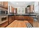Well-equipped kitchen featuring stainless steel appliances and ample cabinet space at 3104 W Fielder St, Tampa, FL 33611