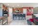 Modern kitchen with island and stainless steel appliances at 409 Serenity Mill Loop, Ruskin, FL 33570