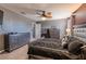 Well-lit bedroom featuring a king-size bed and ample storage at 409 Serenity Mill Loop, Ruskin, FL 33570