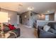 Spacious loft area with seating and neutral color scheme at 409 Serenity Mill Loop, Ruskin, FL 33570