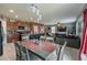 Open concept kitchen and living room with ample seating at 409 Serenity Mill Loop, Ruskin, FL 33570