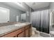 Neat bathroom with shower/tub combo and a single vanity at 409 Serenity Mill Loop, Ruskin, FL 33570