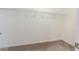 Large walk-in closet with ample shelving and hanging space at 409 Serenity Mill Loop, Ruskin, FL 33570