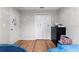 Bedroom with two twin beds and double door closet at 10005 Caraway Spice Ave, Riverview, FL 33578