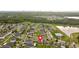 Aerial view of a residential neighborhood highlighting a single-Gathering home's location at 10005 Caraway Spice Ave, Riverview, FL 33578