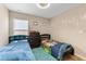 Bedroom with two twin beds and a dresser at 10005 Caraway Spice Ave, Riverview, FL 33578