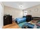 Bedroom with two twin beds and plenty of storage at 10005 Caraway Spice Ave, Riverview, FL 33578