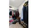 Large walk-in closet with ample shelving and hanging space at 10005 Caraway Spice Ave, Riverview, FL 33578