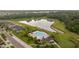 An inviting community pool with a pool house and lush landscaping at 10005 Caraway Spice Ave, Riverview, FL 33578