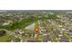Aerial view showcasing a single-Gathering home's location within a residential community at 10005 Caraway Spice Ave, Riverview, FL 33578