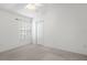 Bright bedroom features carpet and window, creating a peaceful retreat at 11230 Heathrow Ave, Spring Hill, FL 34609