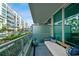 Relaxing condo balcony with lounge seating and serene pool views in a modern complex at 912 Channelside Dr # 2316, Tampa, FL 33602