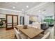 Open-concept dining area featuring a large table and seamlessly connecting to the kitchen at 912 Channelside Dr # 2316, Tampa, FL 33602