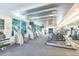 Well-equipped gym with treadmills, weight machines, and ample natural light at 912 Channelside Dr # 2316, Tampa, FL 33602