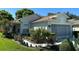 One-story house with landscaped yard at 11230 Heathrow Ave, Spring Hill, FL 34609