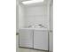 Laundry room with side-by-side washer and dryer at 11230 Heathrow Ave, Spring Hill, FL 34609