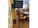 Casual dining area with a Please Seat Yourself sign at 11230 Heathrow Ave, Spring Hill, FL 34609