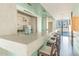 Community kitchen with bar seating and appliances at 912 Channelside Dr # 2316, Tampa, FL 33602