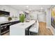 Modern kitchen with an island and stainless steel appliances at 912 Channelside Dr # 2316, Tampa, FL 33602