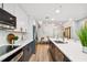Modern kitchen with stainless steel appliances and white cabinetry at 912 Channelside Dr # 2316, Tampa, FL 33602