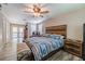 Main bedroom with rustic decor and access to patio at 10313 Widgeon Way, New Port Richey, FL 34654