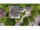 Luxury property featuring a large home, pool, and extensive landscaping at 638 Limona Woods Dr, Brandon, FL 33510