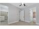 Bedroom with access to closets and ensuite bathroom at 638 Limona Woods Dr, Brandon, FL 33510