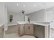 Modern kitchen featuring island, stainless steel appliances, and light wood cabinets at 638 Limona Woods Dr, Brandon, FL 33510