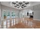 Open floor plan great room with access to kitchen and pool area at 638 Limona Woods Dr, Brandon, FL 33510
