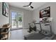 Home gym with treadmill, exercise bike and plenty of space at 638 Limona Woods Dr, Brandon, FL 33510