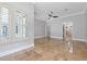 Spacious bedroom with tile floors and large windows with plantation shutters at 638 Limona Woods Dr, Brandon, FL 33510