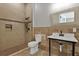 Bathroom with a walk-in shower, toilet and modern vanity at 638 Limona Woods Dr, Brandon, FL 33510
