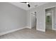 Large bedroom with access to en-suite bathroom and walk in closet at 638 Limona Woods Dr, Brandon, FL 33510