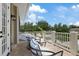 Private balcony with seating area and a view of the neighborhood at 638 Limona Woods Dr, Brandon, FL 33510
